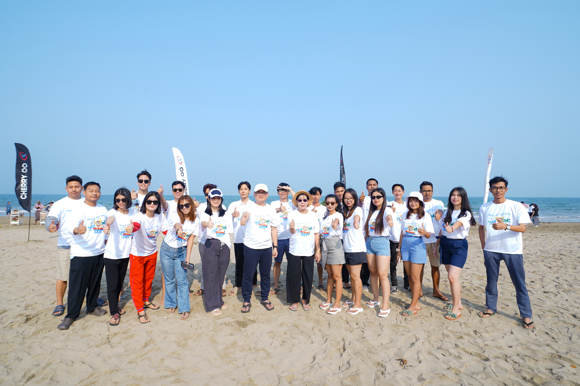 Cherry Oo staff party at the beach